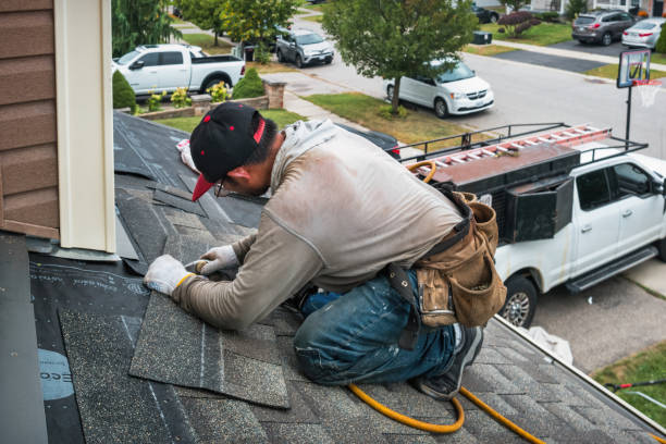 Professional Emergency Roof Repair technician working in Woodbury, NY